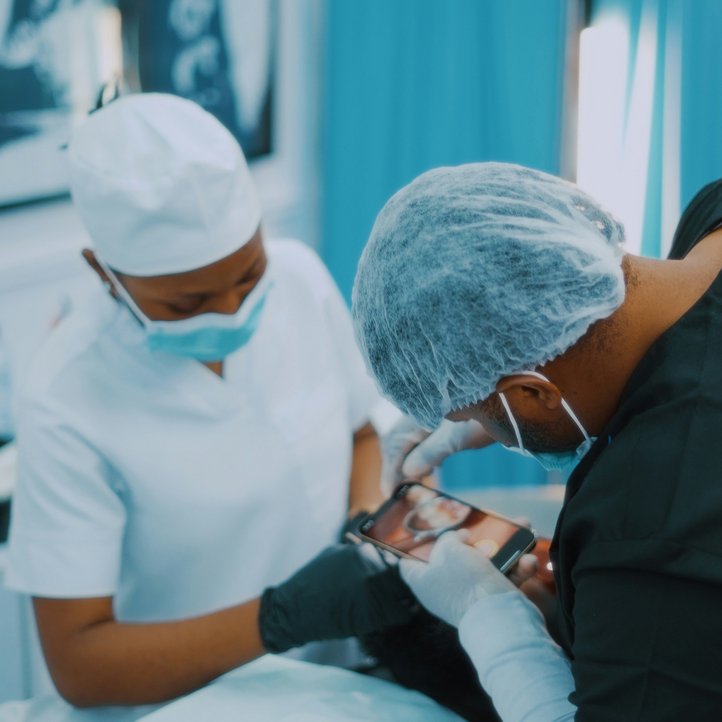 Doctors take a photo of a patient