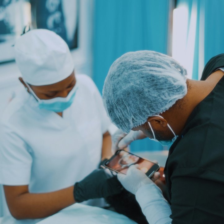 Doctors take a photo of a patient